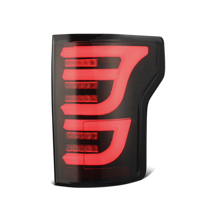 AlphaRex Luxx-Series LED tail light for 2015-2020 Ford F150 in alpha-black finish, featuring a sleek design with bright red LEDs.