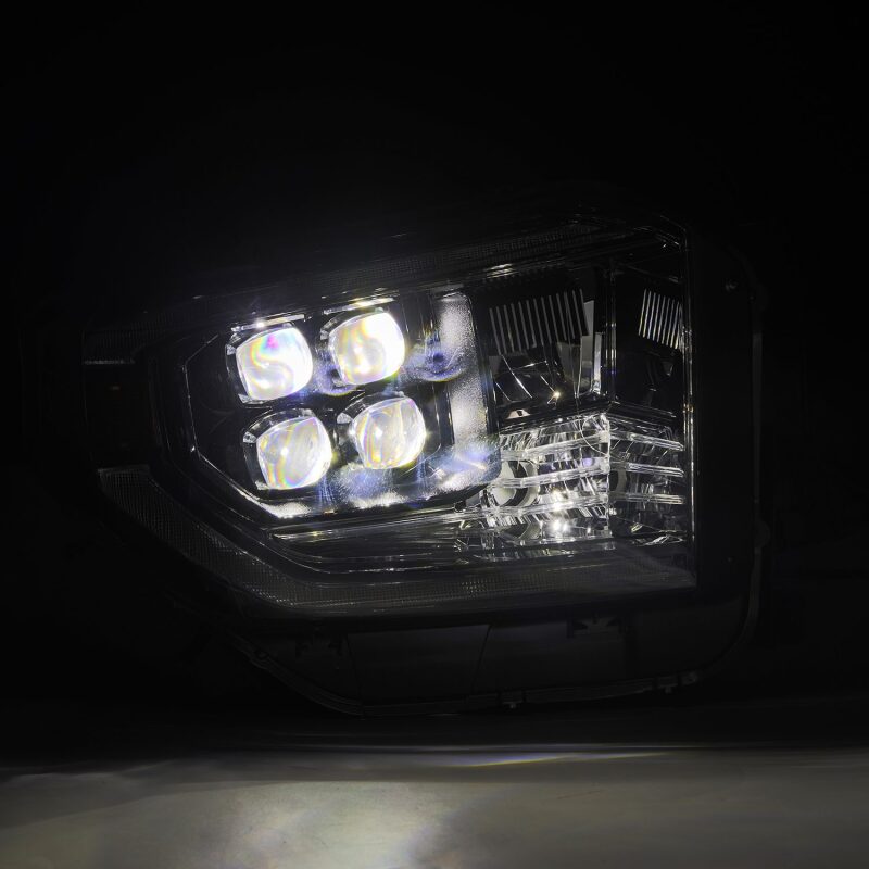 AlphaRex NOVA-Series LED projector headlights for 14-21 Toyota Tundra in black with active light and sequential signals.