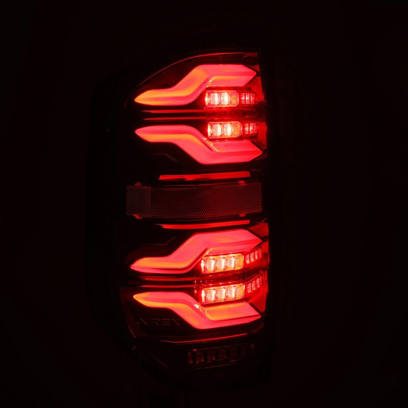 AlphaRex LUXX LED taillights for 14-21 Toyota Tundra in black with sequential signal and active light features.