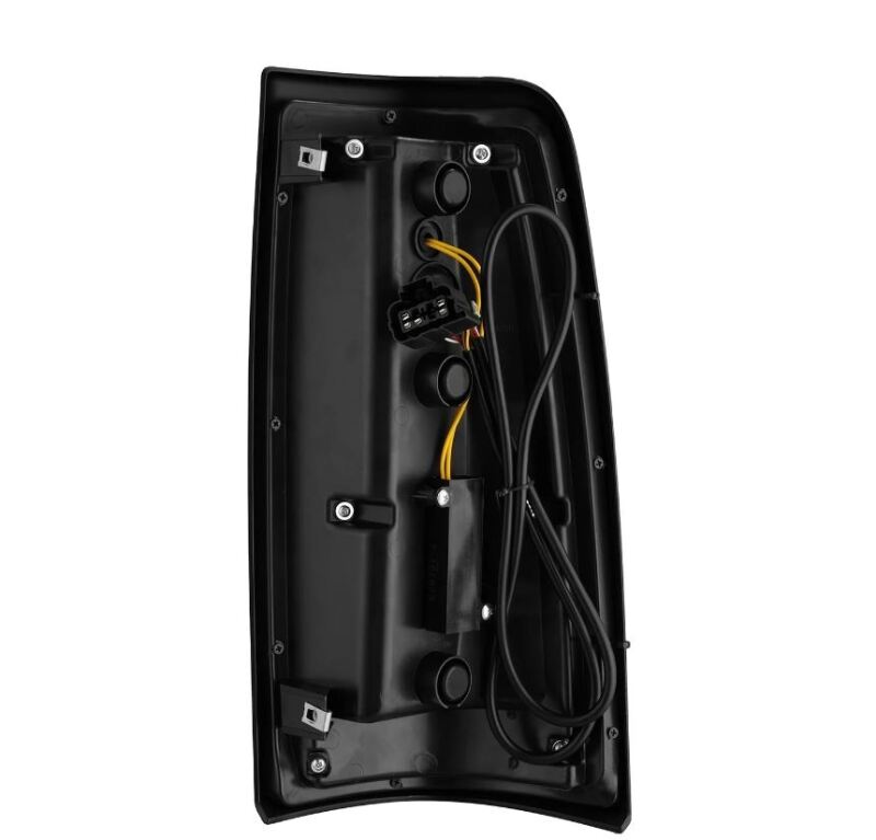 AlphaRex LUXX-Series LED tail lights for 99-06 Chevrolet Silverado Sierra in Alpha-Black finish, showcasing wiring and mounting details.