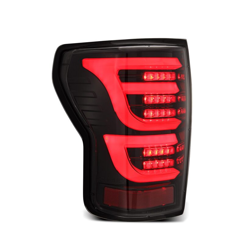 AlphaRex LUXX-Series LED tail lights for 07-13 Toyota Tundra in alpha-black finish, featuring a sleek design and bright illumination.