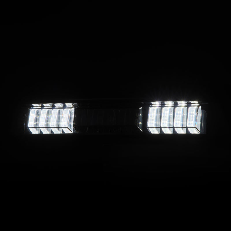 AlphaRex LUXX-Series LED 3rd brake light for 2016-2023 Toyota Tacoma in black smoke finish, featuring bright LED lights.