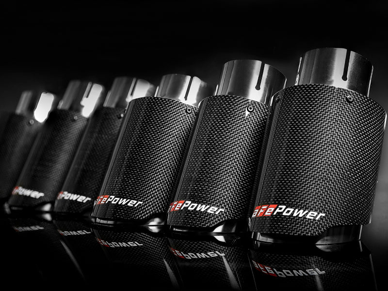 Afe MACH Force-Xp universal exhaust tips lined up, featuring a 2-1/2 inch inlet, 3-1/2 inch outlet, and 7 inch length.