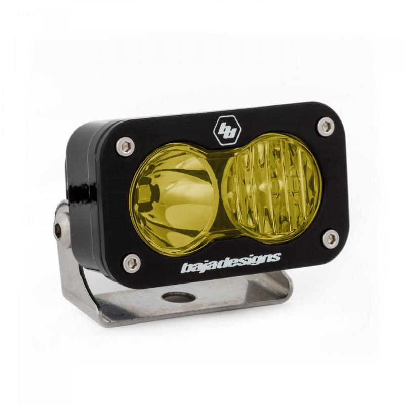 Baja Designs S2 Pro Amber LED driving light with a compact design, featuring dual lenses and a sturdy mounting bracket.