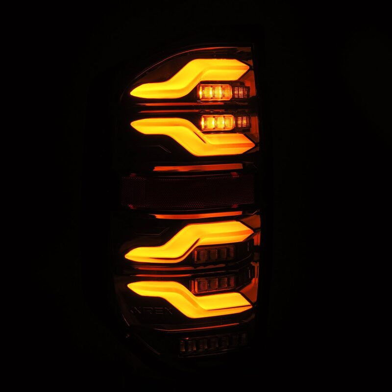AlphaRex LUXX LED taillights for 14-21 Toyota Tundra, featuring black housing and sequential signal lights.