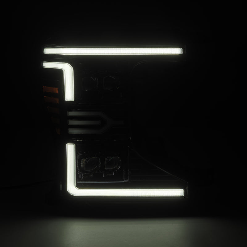 AlphaRex NOVA-Series LED projector headlights for 20-22 Ford F-250/350/450, featuring a sleek black design and bright LED accents.