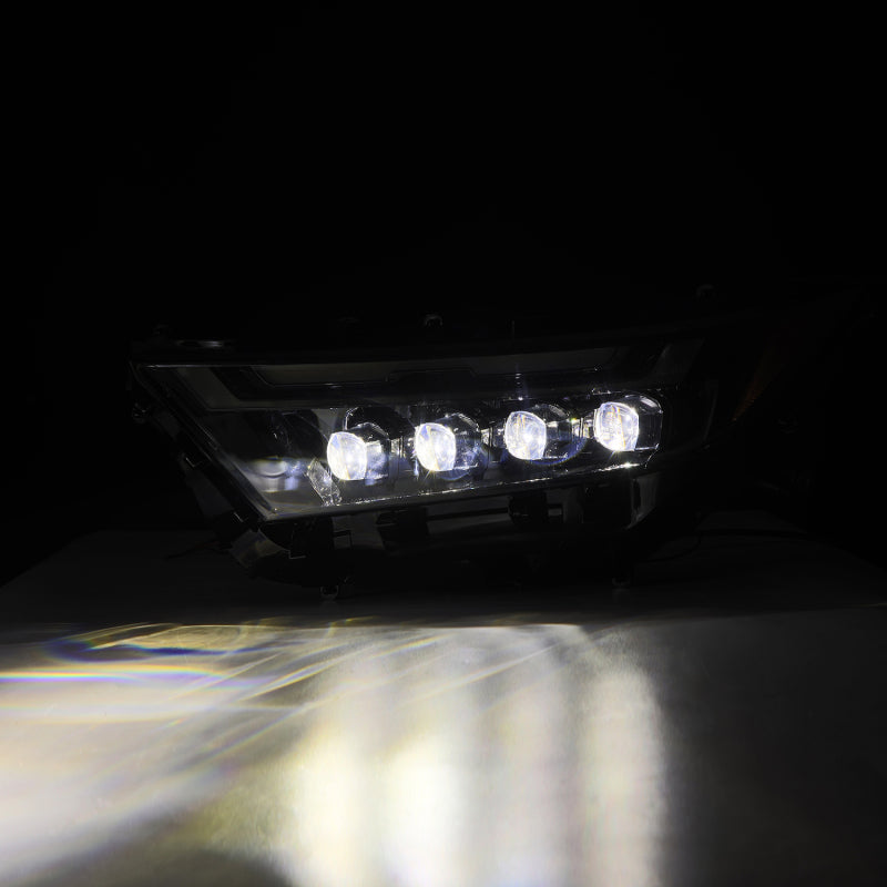 AlphaRex NOVA LED projector headlights for 2019-2023 Toyota RAV4 in alpha-black finish, showcasing bright illumination.
