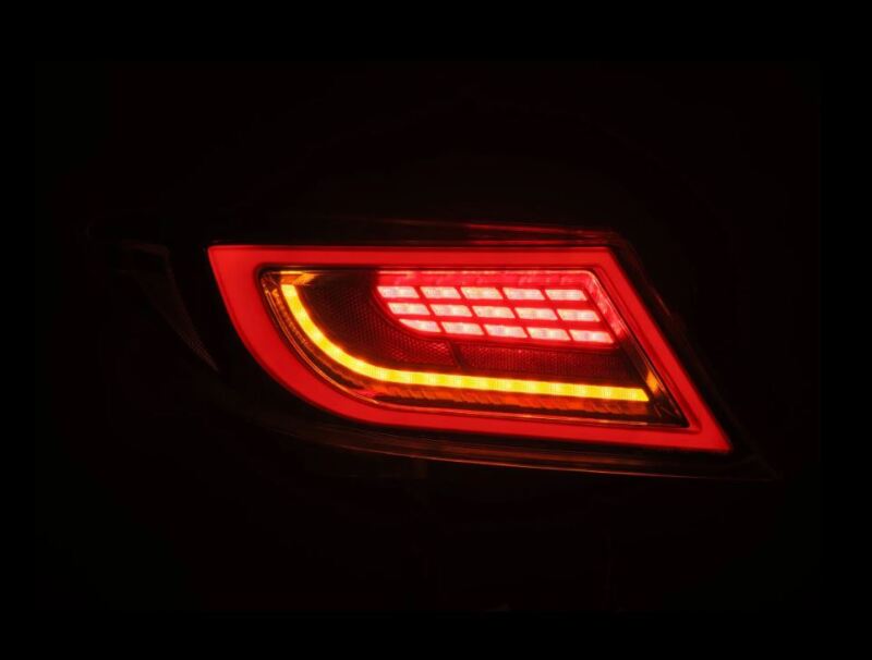 AlphaRex 22-24 Toyota GR86 LUXX LED taillight in Alpha-Black, featuring a sleek design with bright red illumination.