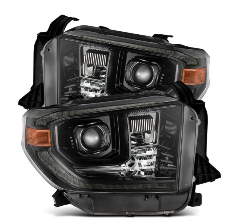 AlphaRex projector headlights for 14-21 Toyota Tundra in black with sequential signals and daytime running lights.