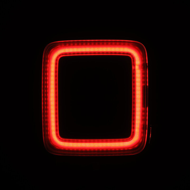 AlphaRex NOVA Prismatic LED taillight for 2018-2023 Jeep Wrangler JL in Alpha-Black finish, featuring a sleek red design.