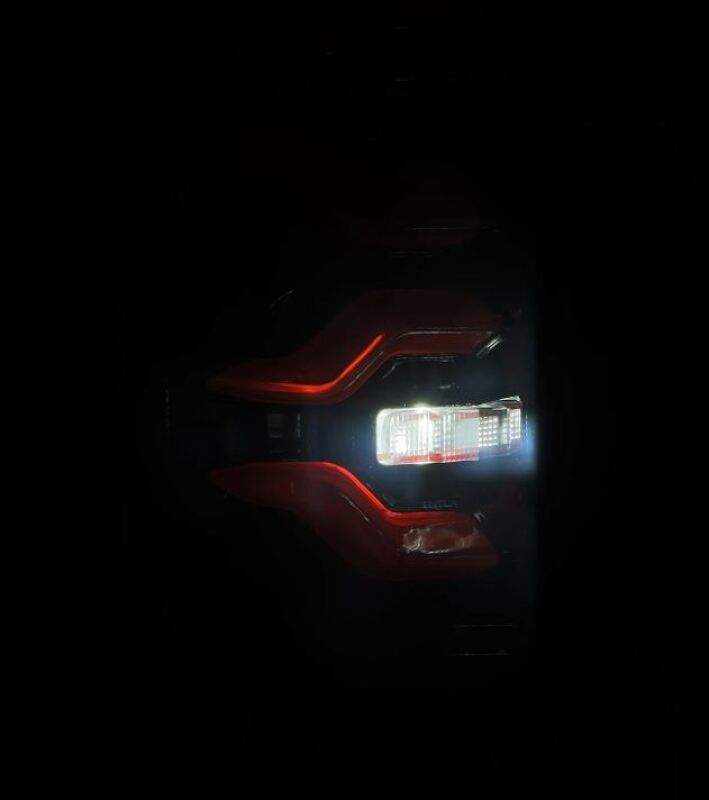 AlphaRex Luxx-Series LED tail lights for 87-96 Ford Bronco/F-150 in black and red, showcasing a modern design and bright illumination.