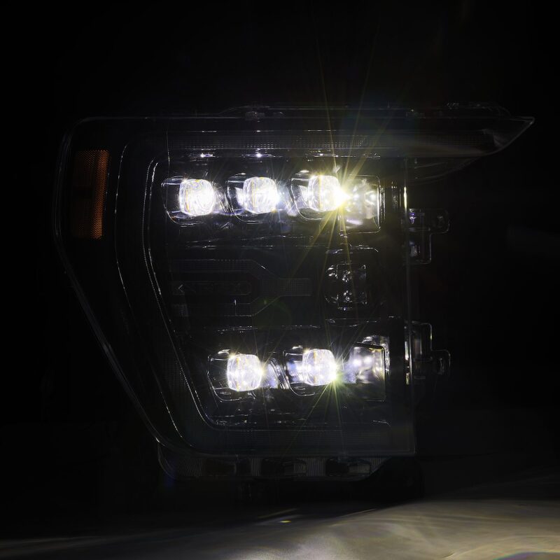 AlphaRex NOVA LED projector headlights for 2021-2022 Ford F-150 in black with sequential signal and active light features.