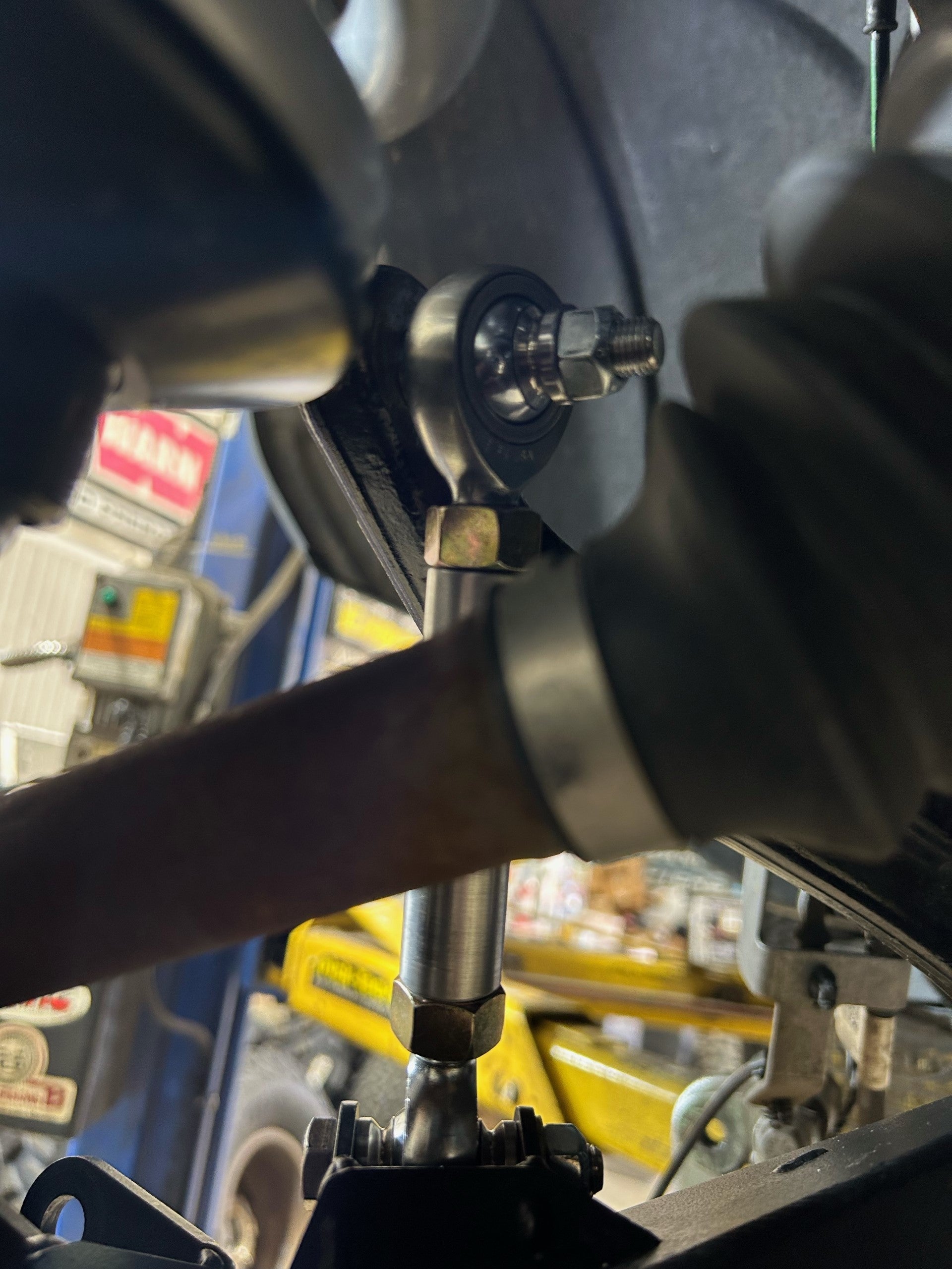 Bronco 2021+ sway bar links installed on stock sway bar and fabricated A-arms, showcasing high-quality components.