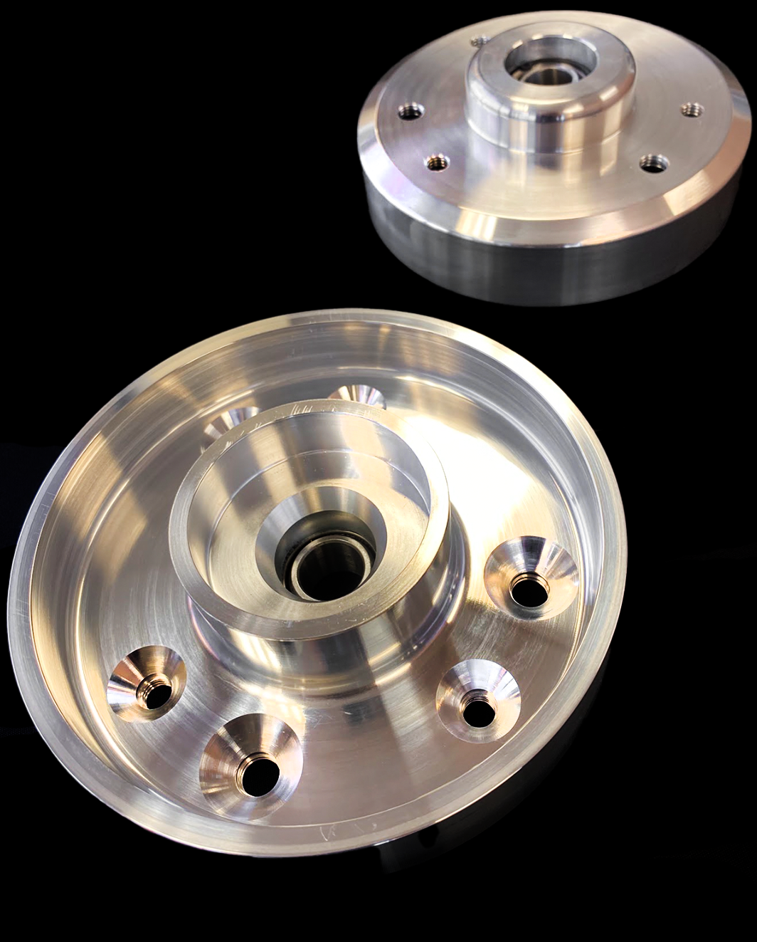 Billet aluminum top hat for 2010-2014 Raptor stock shocks, designed for stock height without lift. Durable and precise.