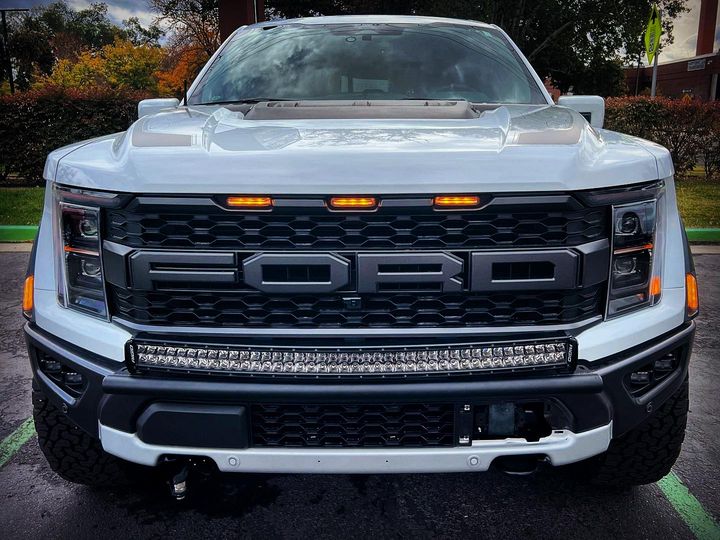 2024 Raptor front light mount kit on a truck, featuring a modular bumper and customizable light options.