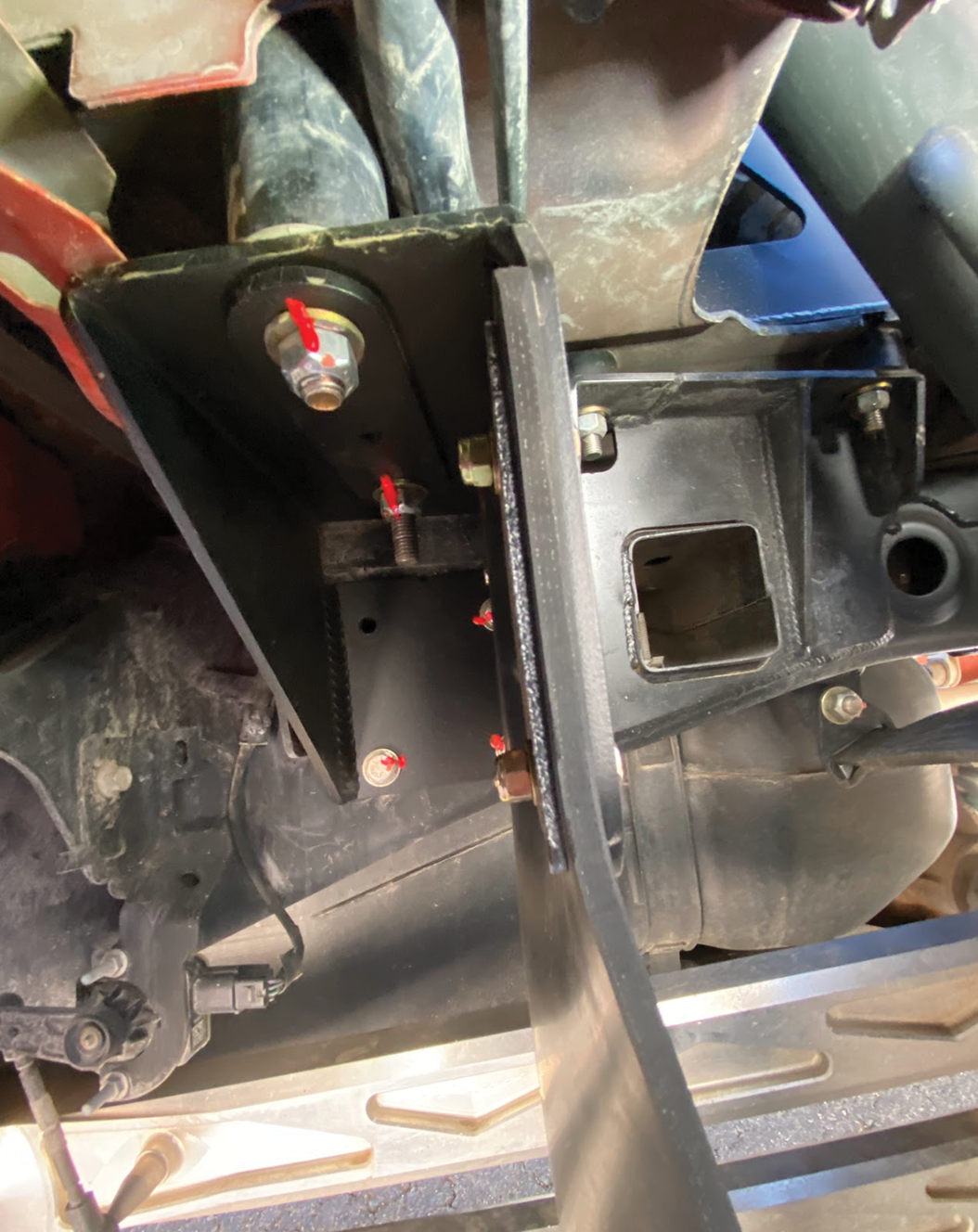 Rear shock guard mud flap frame mount kit for 2017-2024 Gen 2 & Gen 3 Raptor, showcasing installation components and hardware.