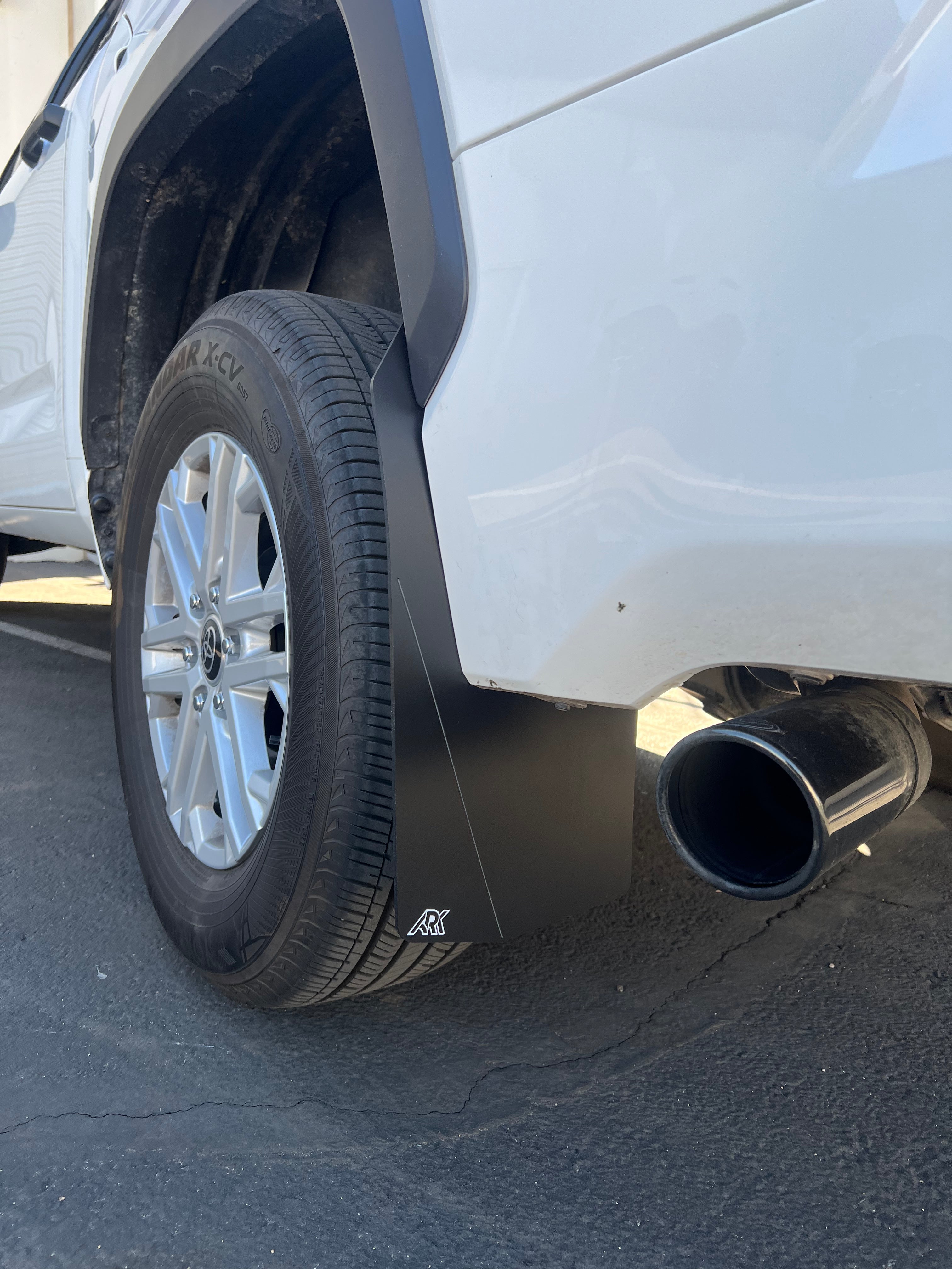 2022+ Toyota Tundra TriXPoly Mudflaps installed on a truck, showcasing durability and protection from mud and debris.