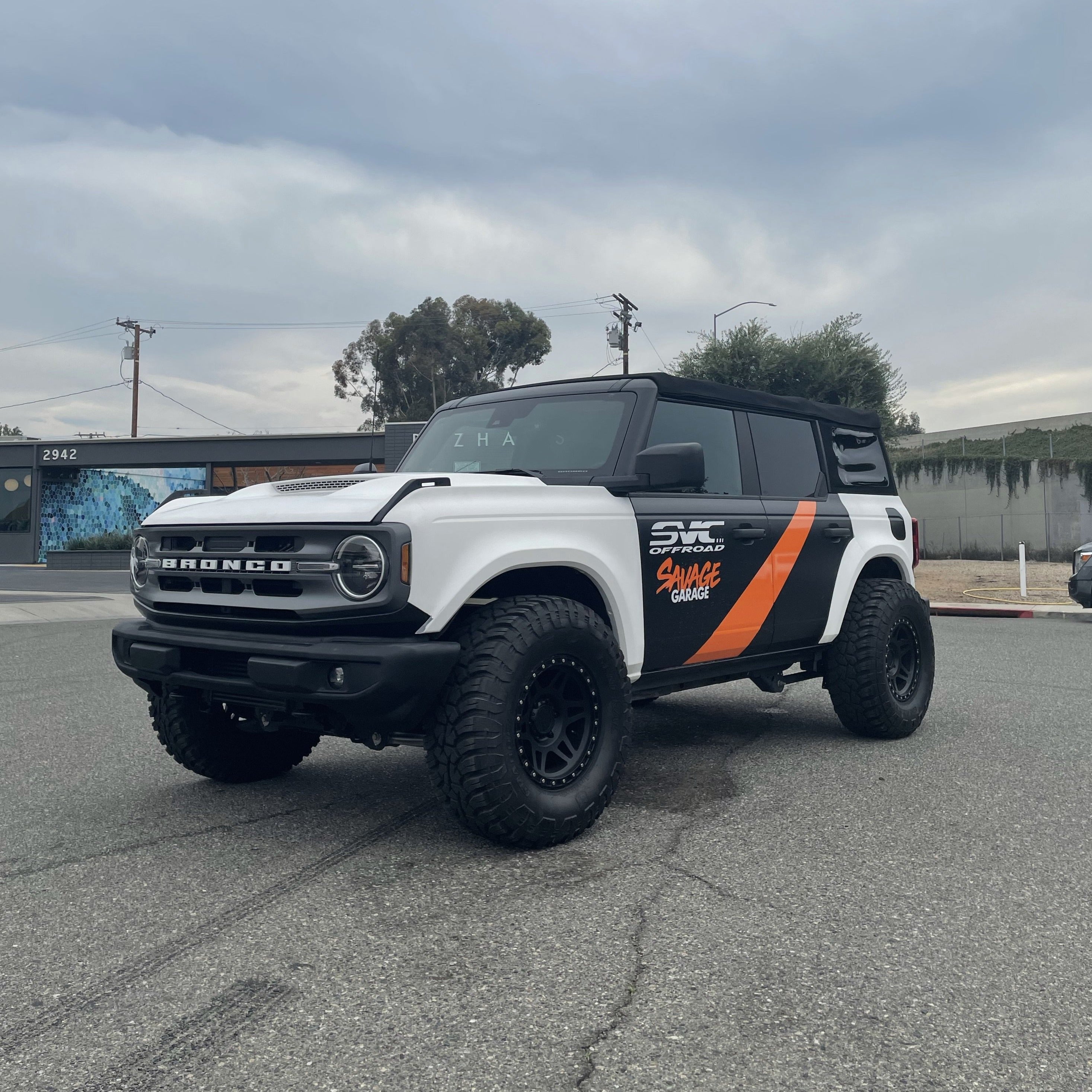 2021-2025 Ford Bronco fenders displayed on a modified Bronco with off-road tires and a custom paint job.