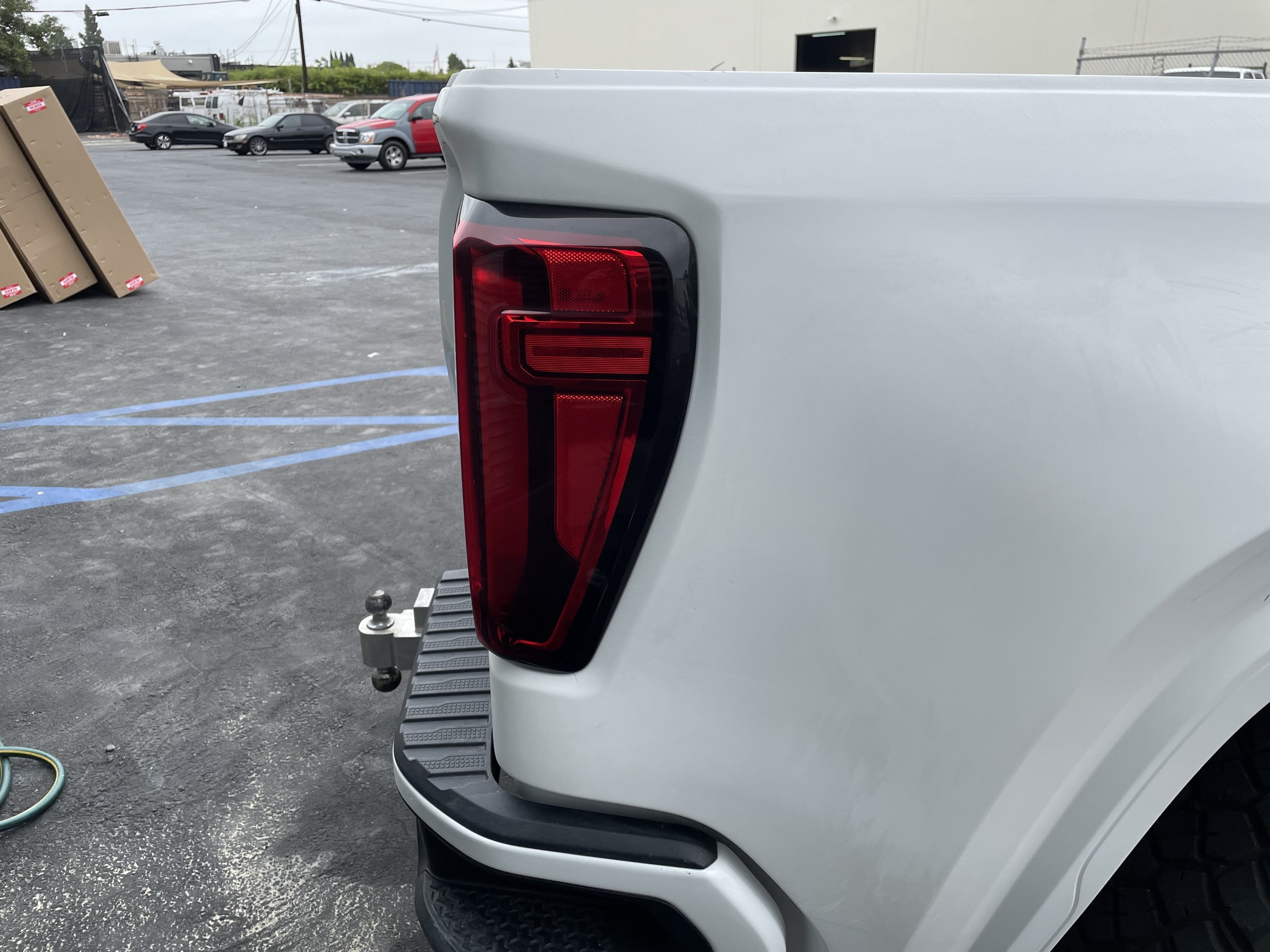 2019-2025 GMC Sierra bedsides showcasing sleek design and modern taillight integration for enhanced style and functionality.