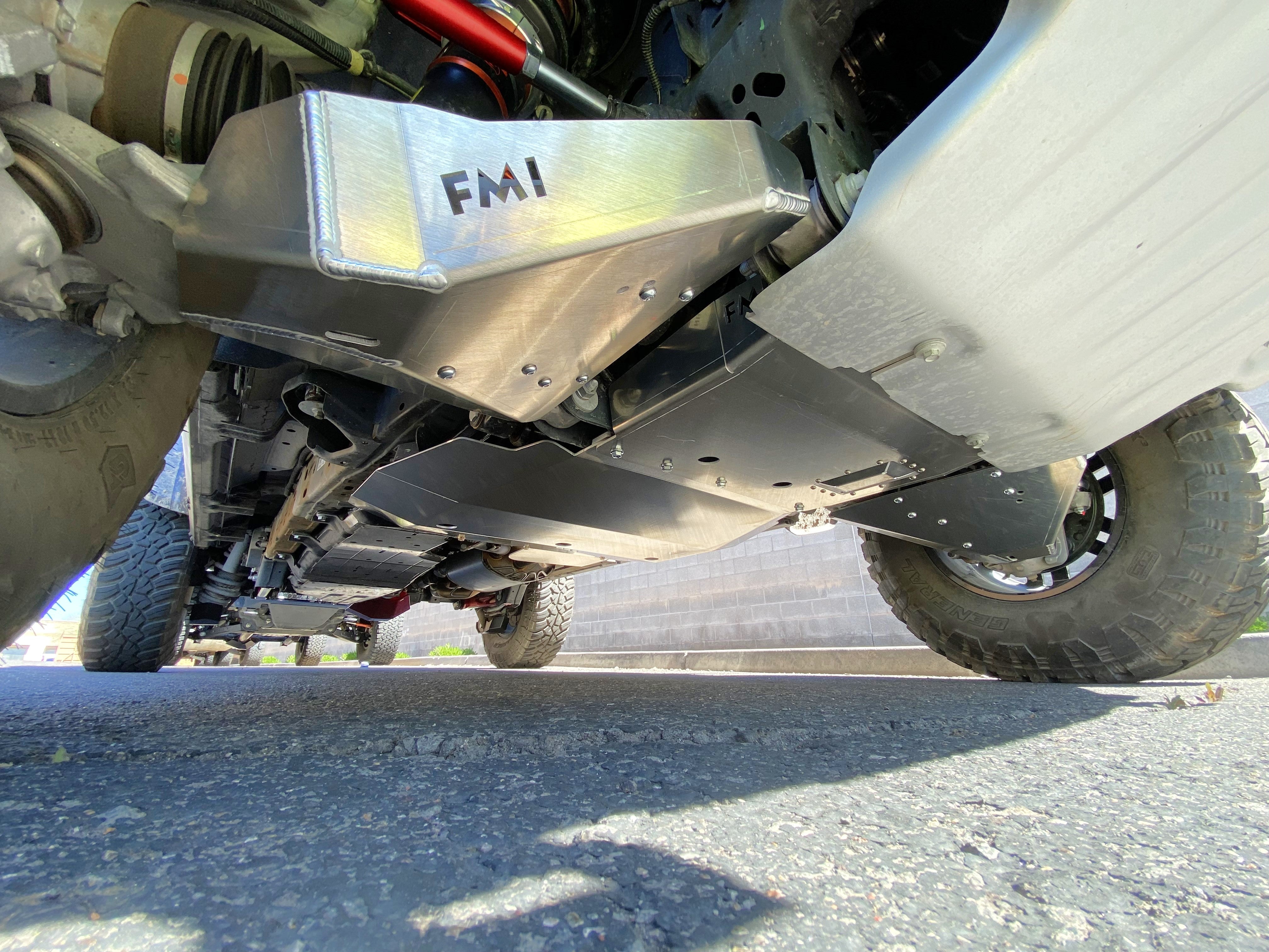 Bronco Raptor 2022 lower control arm skid plate kit installed, showcasing durable protection under the vehicle.