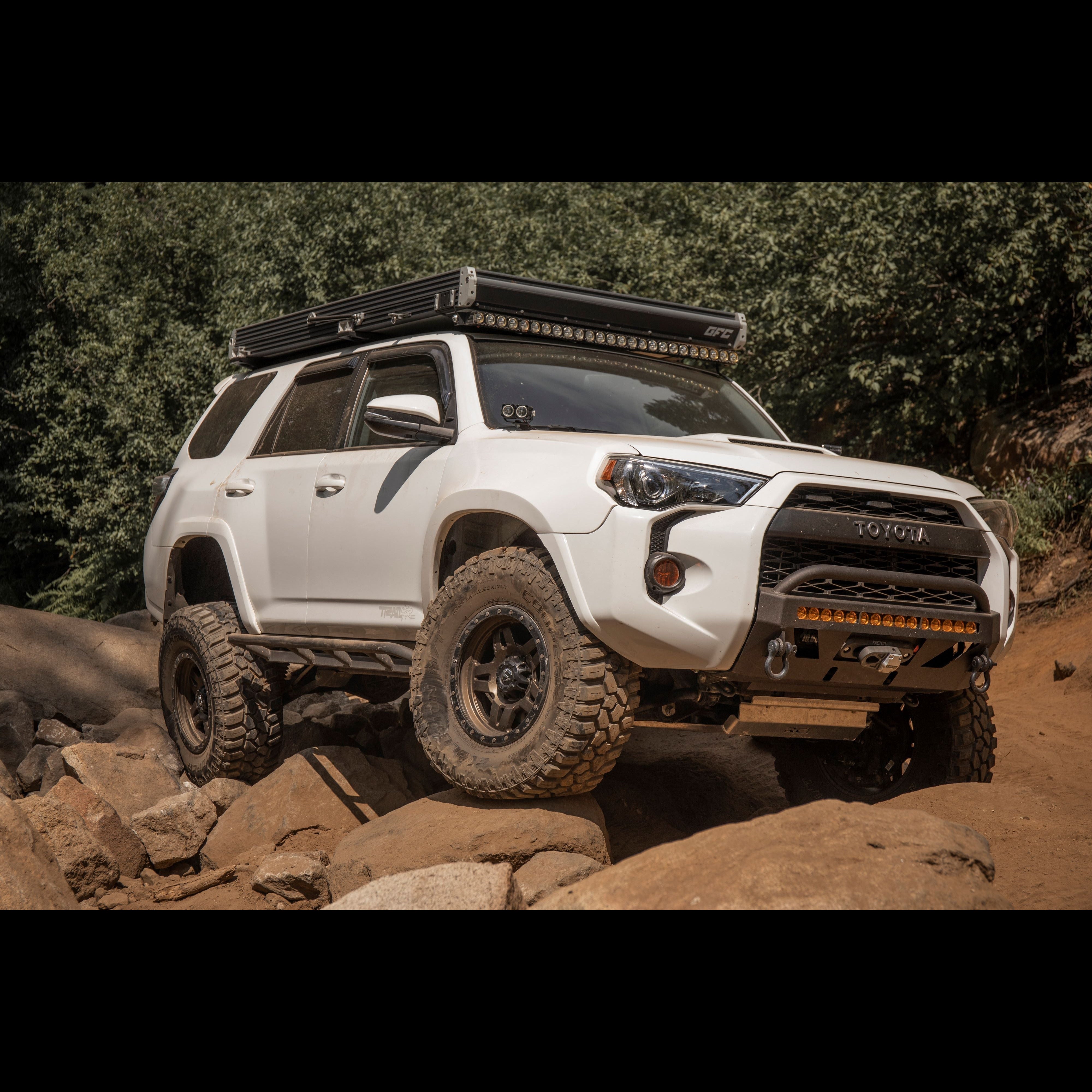 4Runner Lo-Pro winch bumper for 5th Gen models 2014-2024, showcasing rugged design on an off-road vehicle.