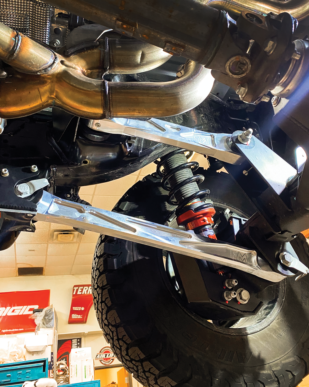 2024 Ranger Raptor rear suspension kit featuring billet aluminum arms and Ultra-Flex joints for enhanced offroad performance.