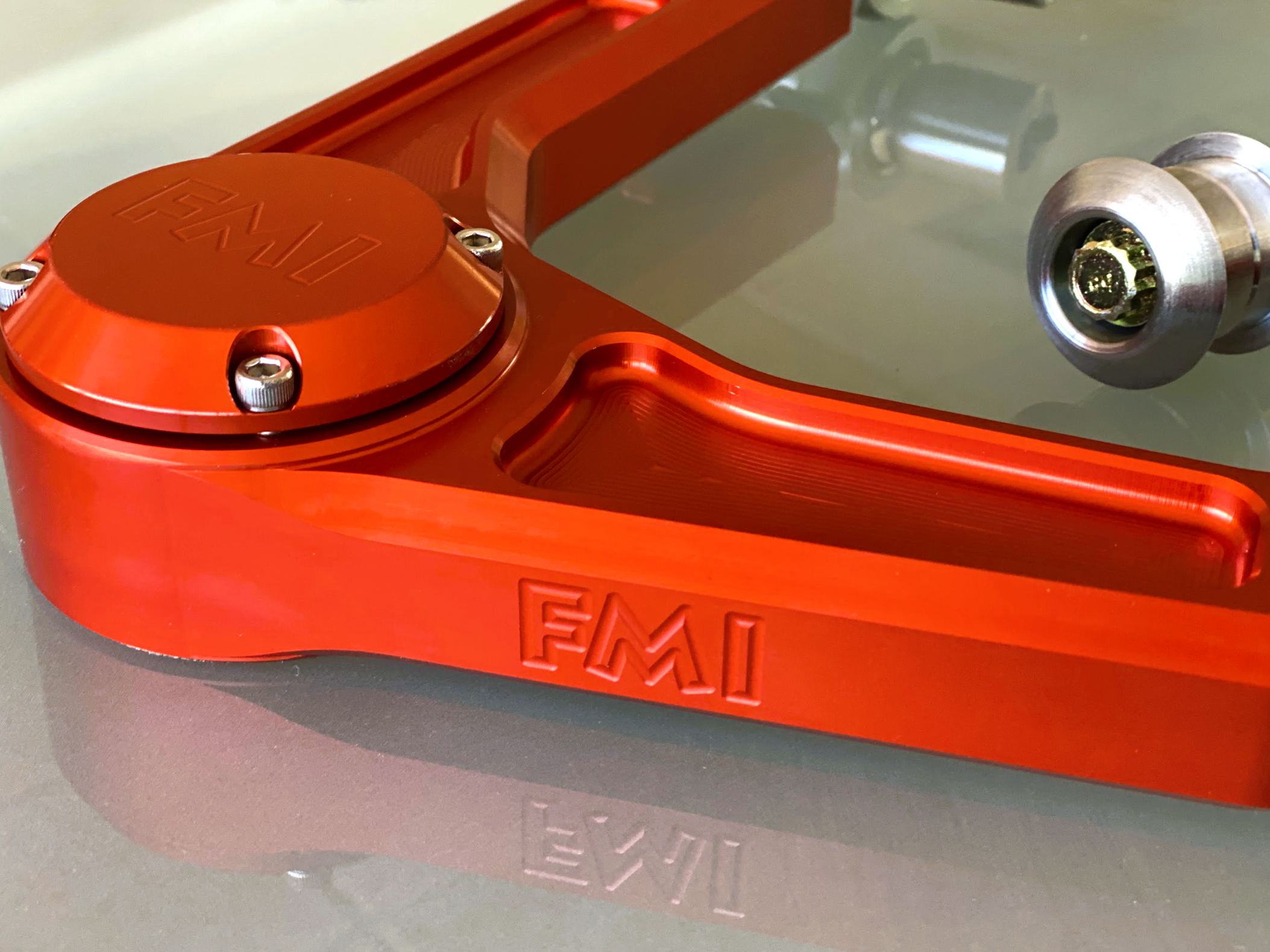 2024 Ranger Raptor billet upper control arm kit in vibrant orange, showcasing precision engineering and stock length design.