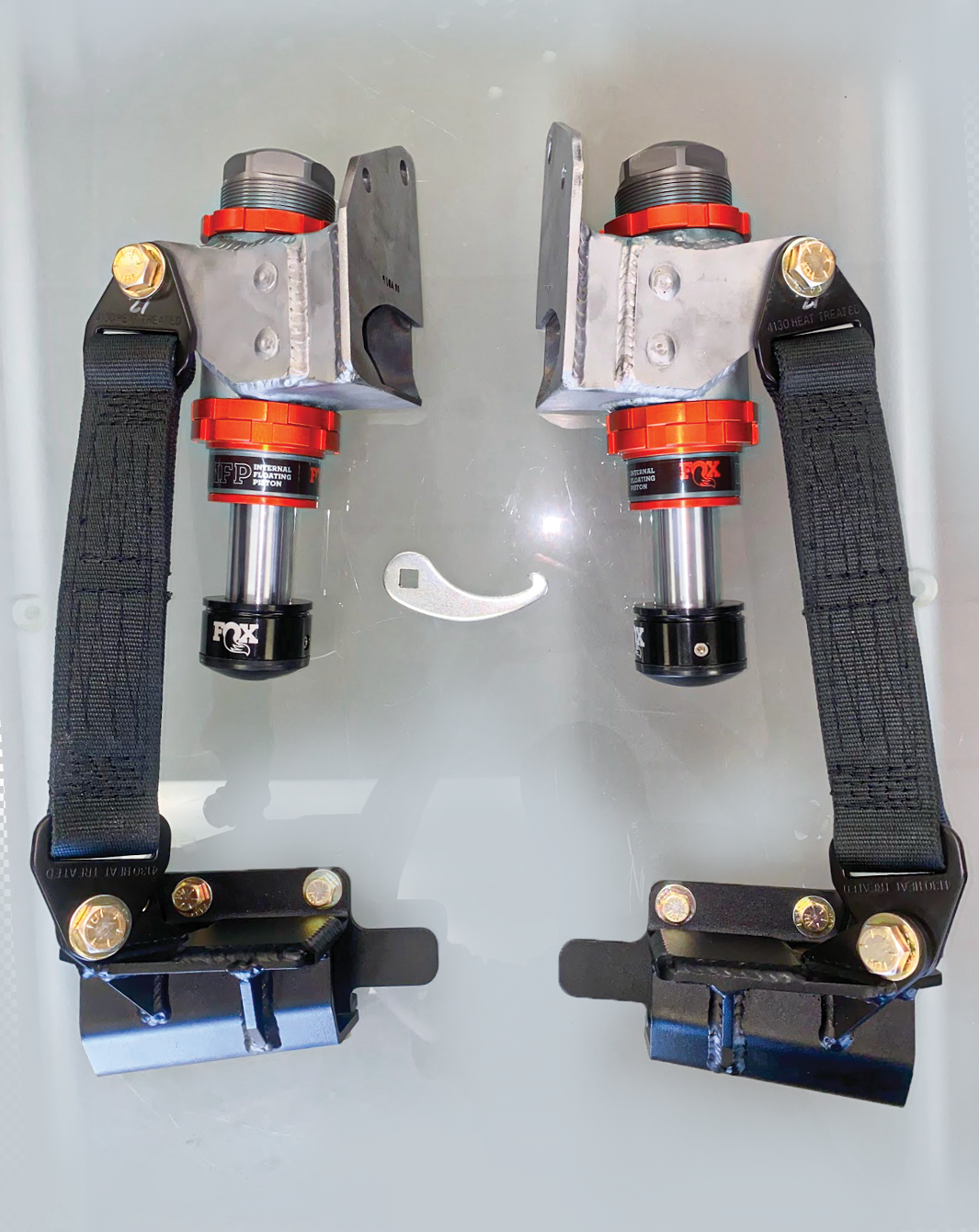 2024 Ranger Raptor front limit strap kit and bump stop for stock lower arm, featuring durable straps and shock components.