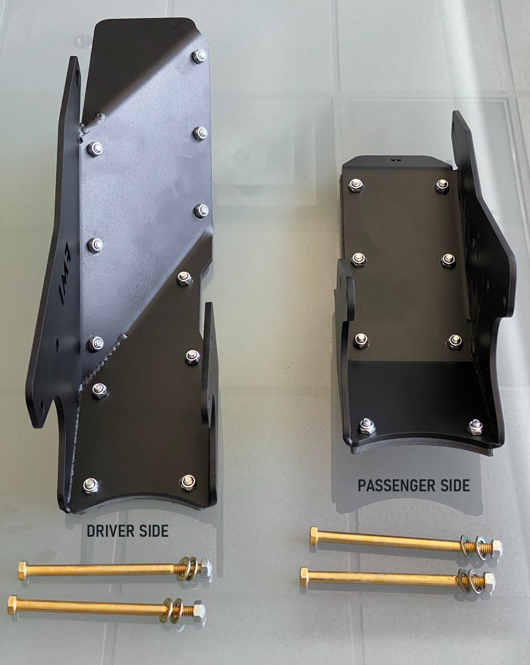 2024 Ranger Raptor rear lower arm frame guard set with HDPE slide, includes driver and passenger side components and bolts.