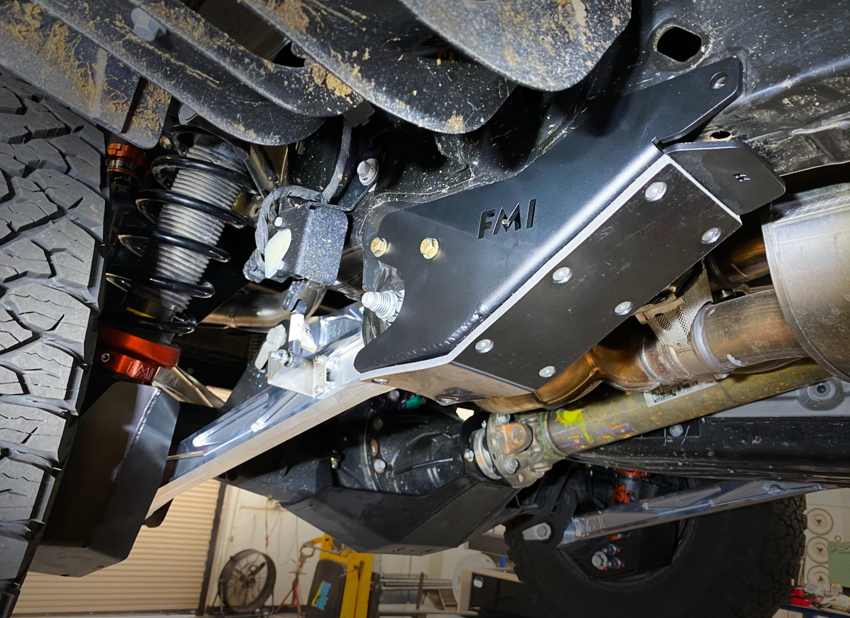 2024 Ranger Raptor rear lower arm frame guard with HDPE slide, showcasing durable protection and offroad readiness.