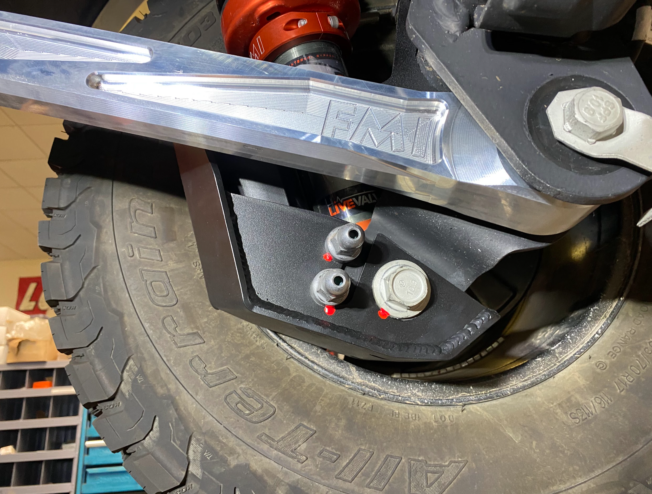 2024 Ranger Raptor rear shock skid kit showcasing durable protection for offroad suspension components.