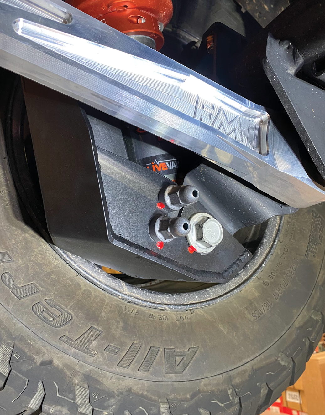 2024 Ranger Raptor rear shock skid kit installed, showcasing durable protection for offroad performance.