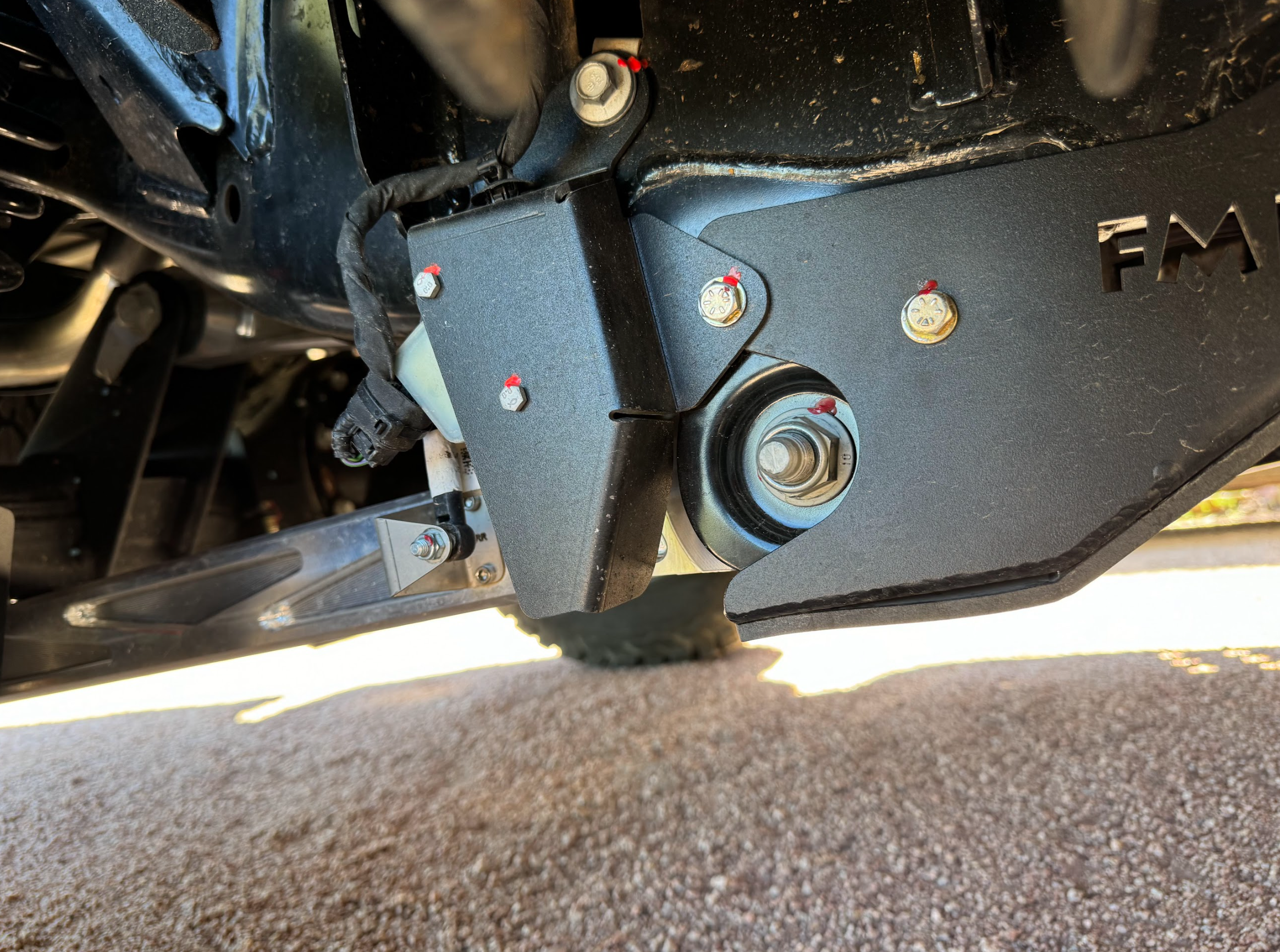 Rear suspension travel sensor protection guard for 2024+ Ranger Raptor, enhancing durability and performance.