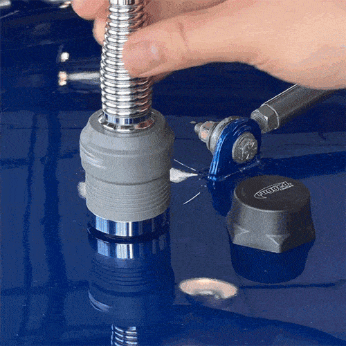Antenna coax cable cap being installed on an NMO mount, showcasing a secure fit and durable design for vehicle antennas.