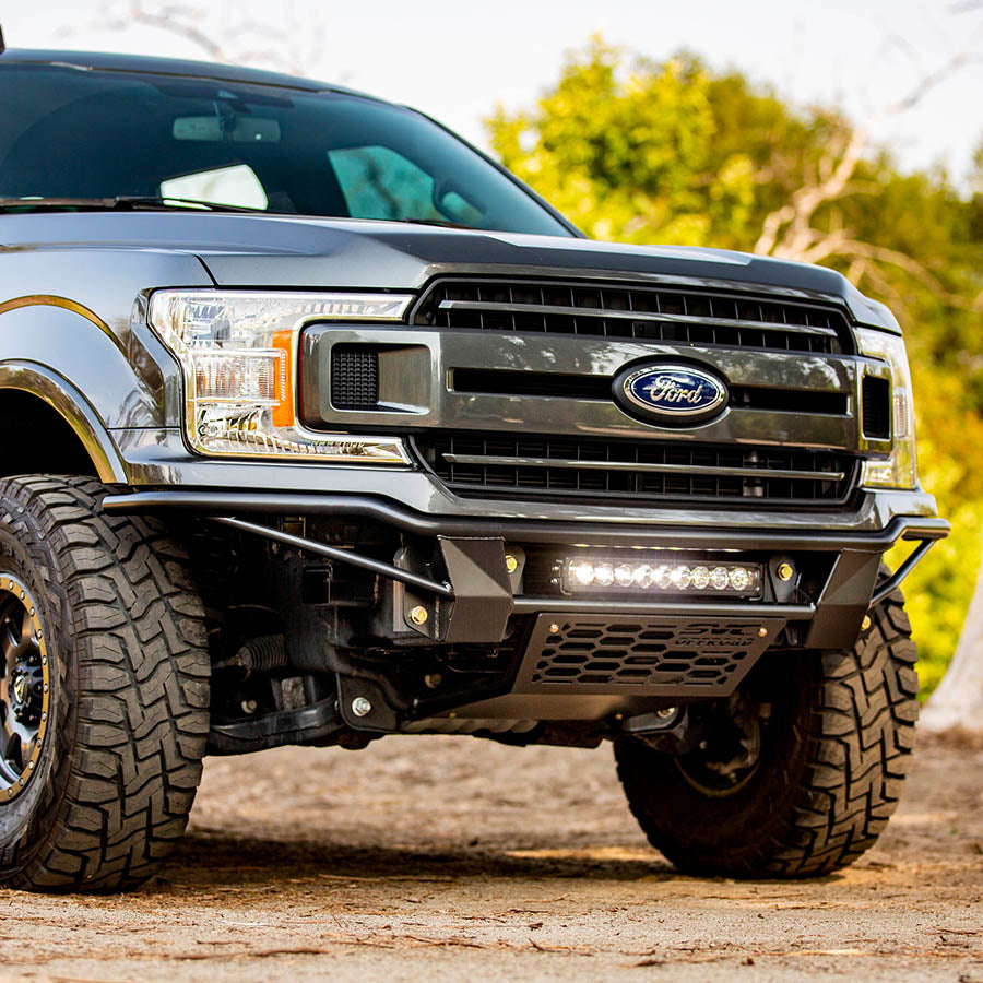 2018-2020 F-150 Baja Bolt-On Bumper showcasing rugged design and integrated LED lights for enhanced off-road performance.