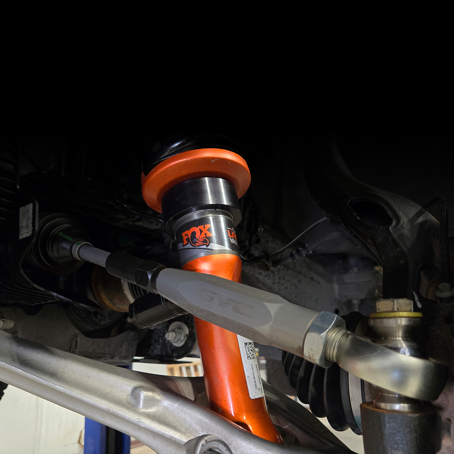 2024 Ranger Raptor 35 Starter Kit featuring a close-up of a FOX shock absorber and suspension components.
