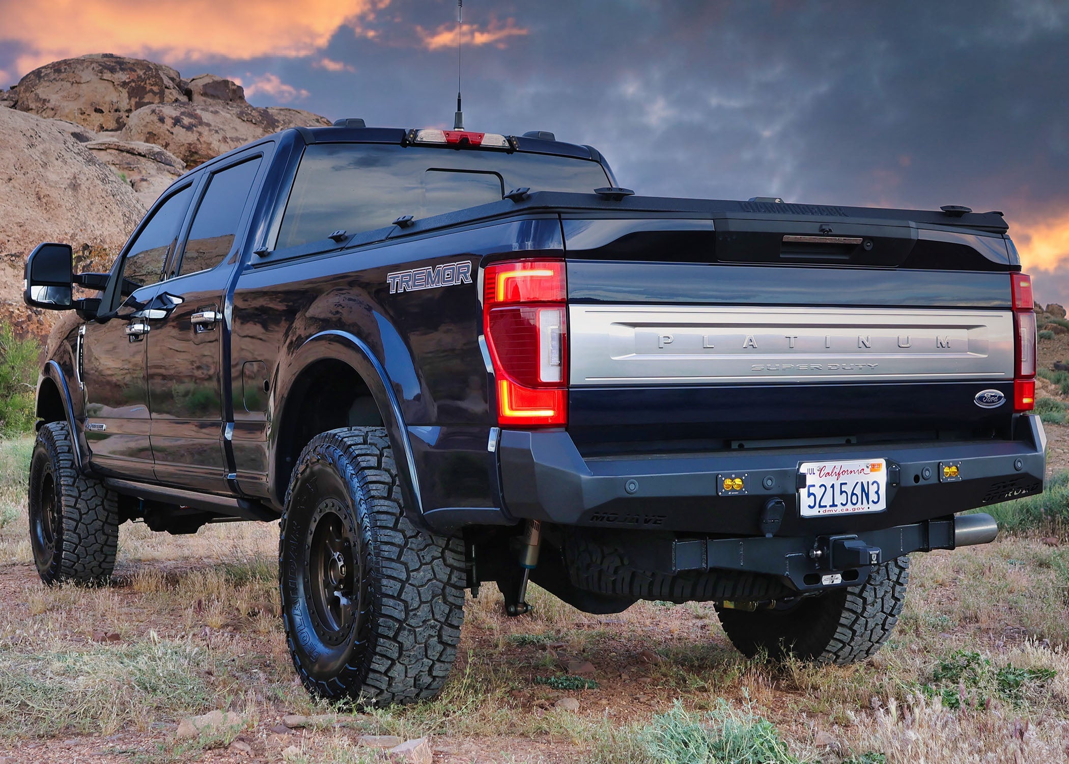 2017-2022 Ford Super Duty Mojave rear bumper installed on a black truck, showcasing rugged design and off-road capability.