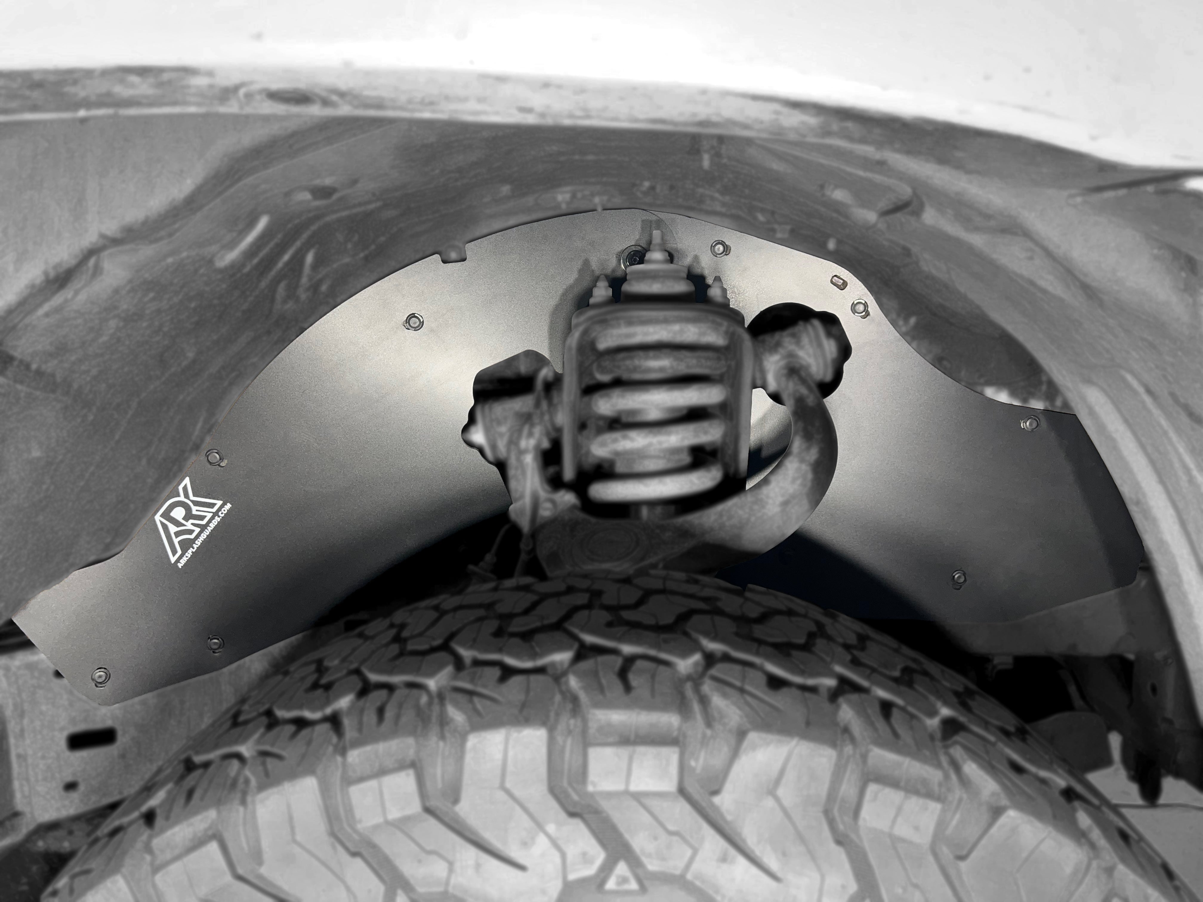 TriXpoly splash guards for 2005-2015 Toyota Tacoma, designed for durability and protection against mud and debris.