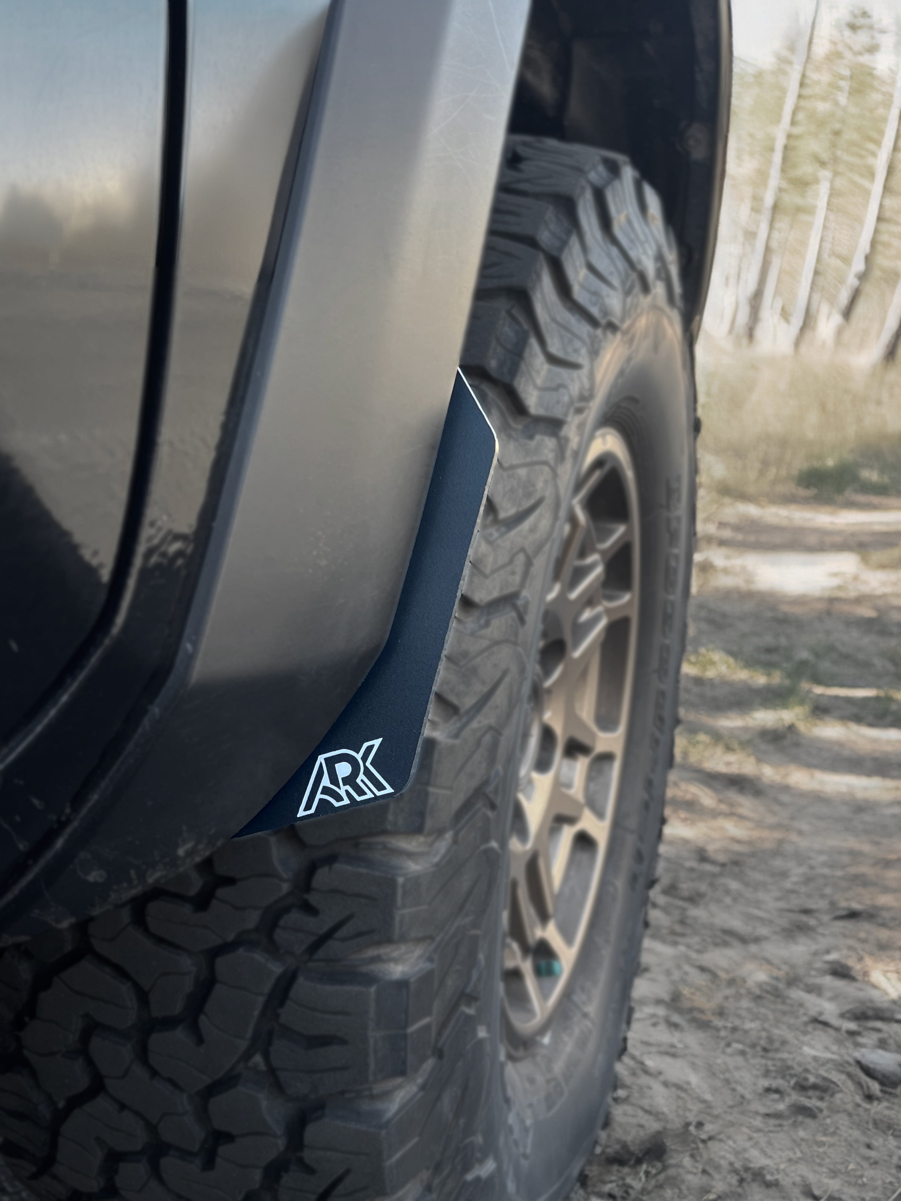 TriXpoly splash guards and mudflap micros for 2016-2023 Toyota Tacoma, designed for off-road protection and style.
