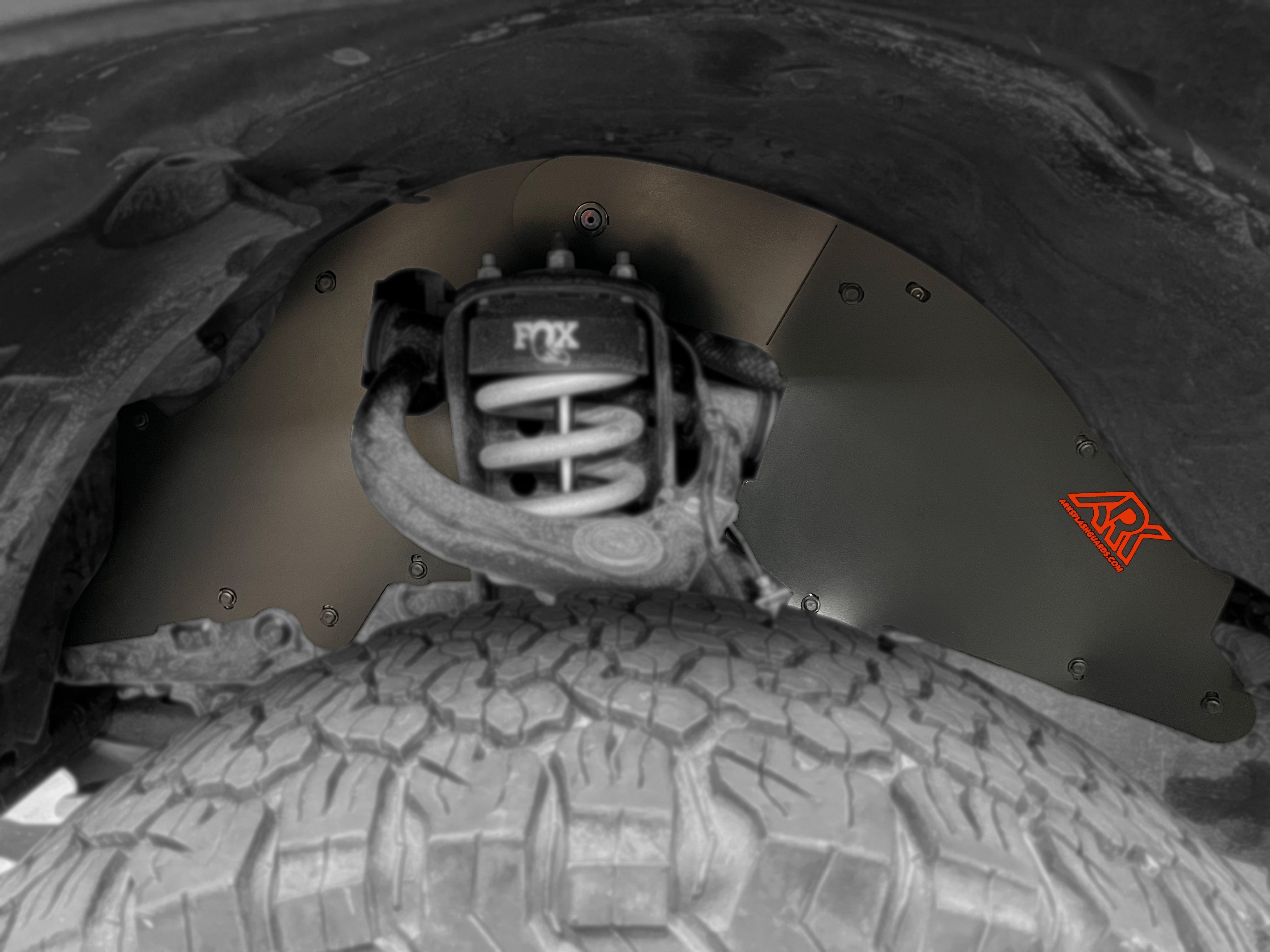 TriXpoly splash guards for 2016-2023 Toyota Tacoma, designed for durability and protection from debris and mud.