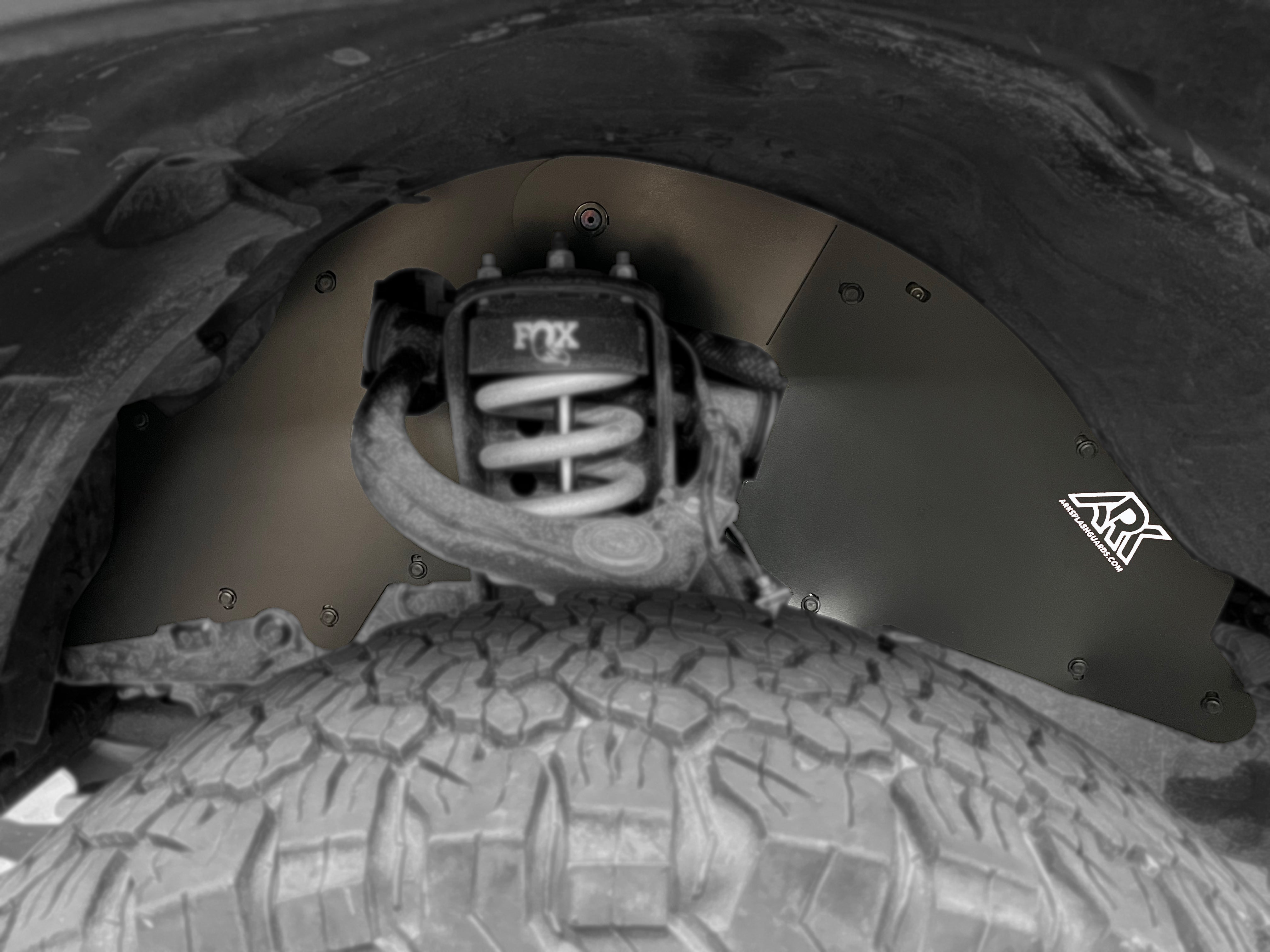 TriXpoly splash guards for 2016-2023 Toyota Tacoma, designed for durability and protection against debris and mud.