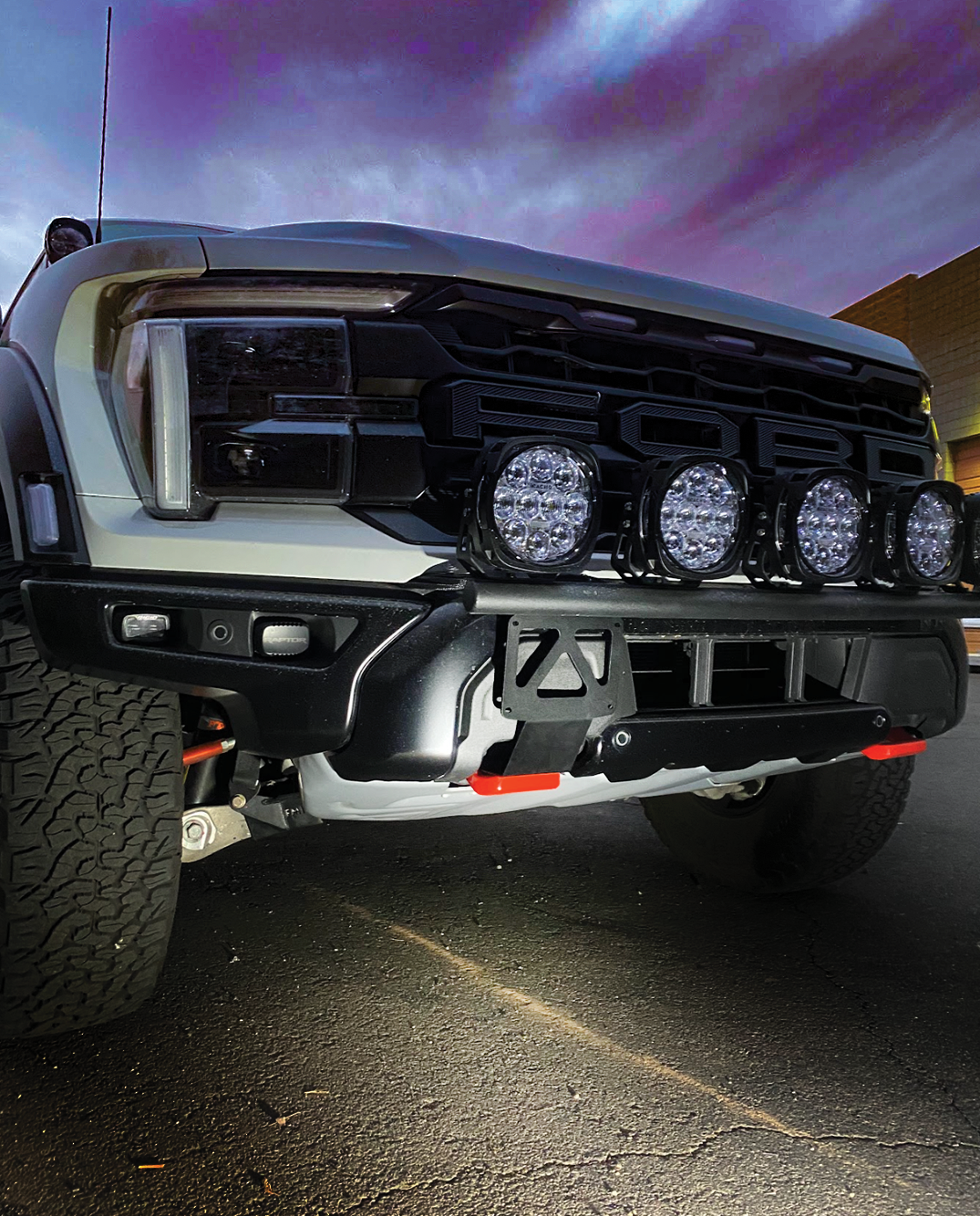 Front tow hook license plate mount for 2024+ Gen 3.5 Raptor, showcasing rugged design and compatibility with offroad accessories.