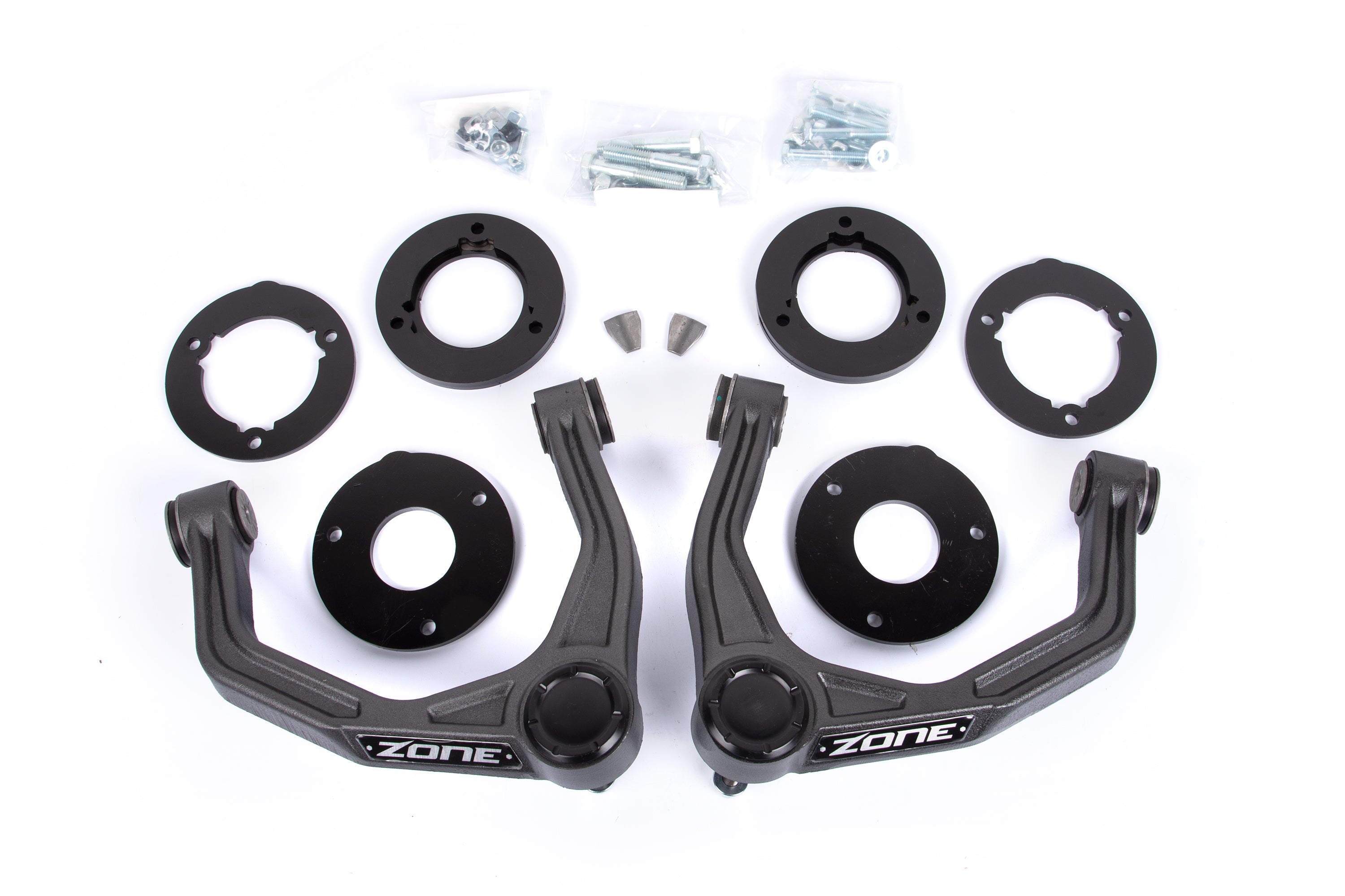 1.75 inch lift kit components for Chevy Silverado and GMC Sierra 1500 AT4 and Trail Boss, including control arms and spacers.