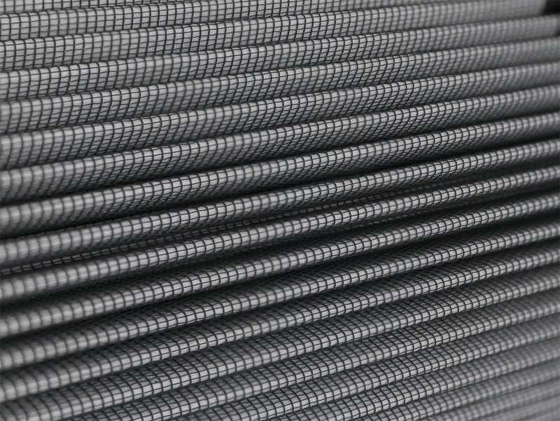 aFe MagnumFLOW Air Filter with a textured surface, designed for optimal airflow and filtration in vehicles.