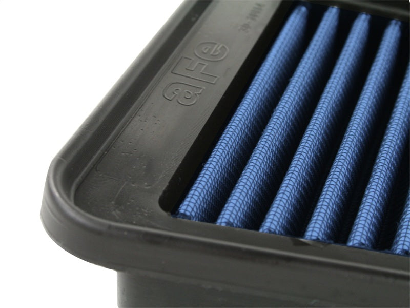 aFe MagnumFLOW Air Filter for Toyota Tacoma 05-12 V6-4.0L featuring a blue filter media and durable frame.