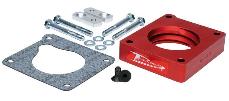 Airaid PowerAid throttle body spacer for 1994-1995 Ford Mustang 5.0L, includes mounting hardware and gaskets.
