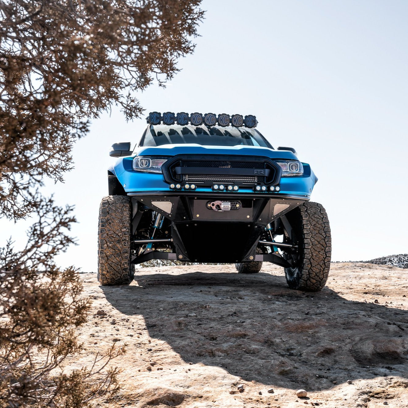 2019-2022 Ford Ranger fenders on a modified truck showcasing offroad capabilities in a rugged landscape.