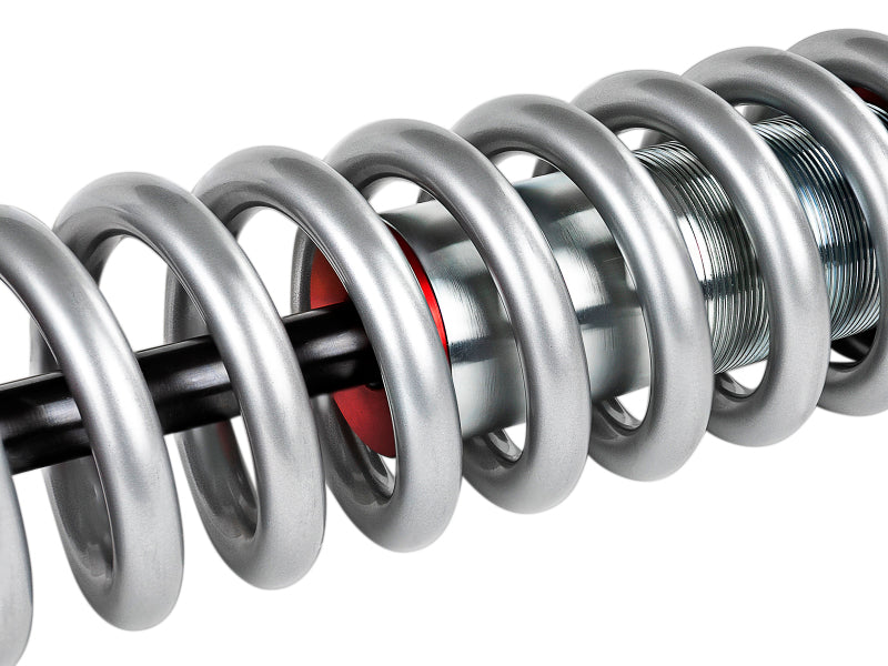 aFe Sway-A-Way 2.5in Front Coil Over Kit for 04-15 Nissan Titan showcasing a close-up of the coil and shock assembly.