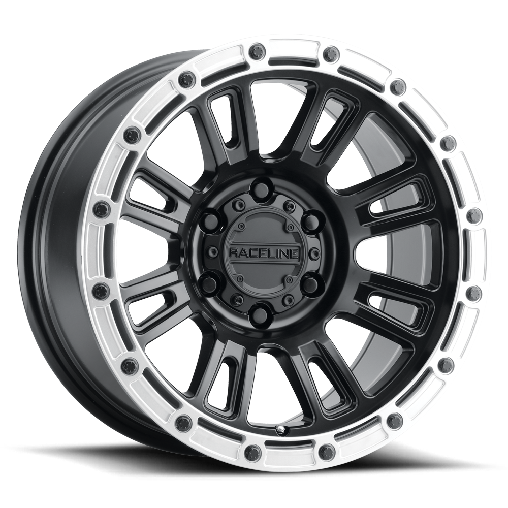 Black and silver Raceline 956BS Compass wheel featuring a multi-spoke design and rugged finish, ideal for offroad vehicles.