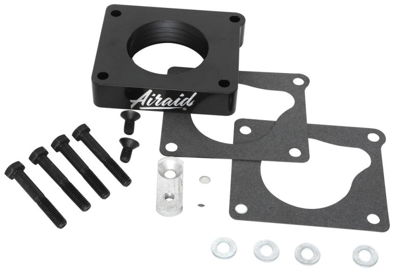 Airaid PowerAid throttle body spacer for 94-95 Ford Mustang 5.0L, includes gaskets and installation hardware.